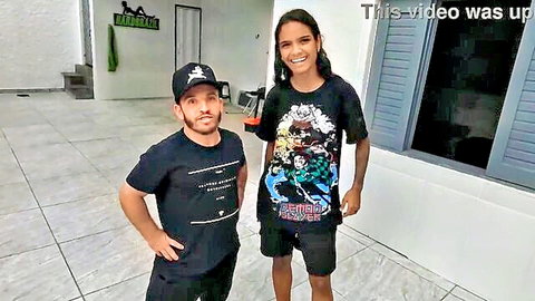 Jasmine poses with midget partner in casual tees, seductive smile