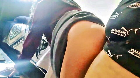 Amateur student step-niece in Puma top and gray skirt showing curvy ass and thigh