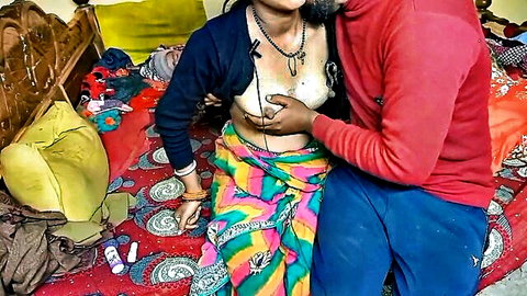 Indian shopkeeper lady with exposed breasts embraced by man in amateur one night stand