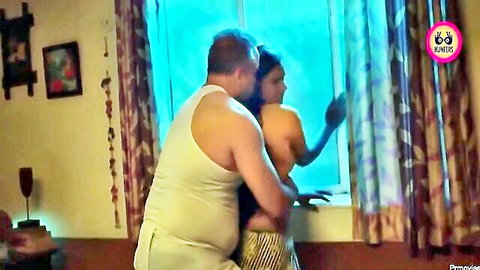 Indian couple in intimate standing embrace, man hugging woman from behind in Karzdaar S1e1