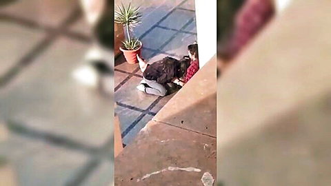 Indian girlfriend kneeling for outdoor blowjob, caught on camera