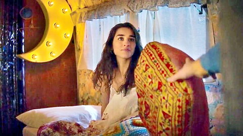 Simona Tabasco in sheer white slip on bed, Luna Park nude scene 2021