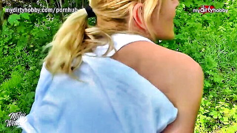 Blonde German MILF in white tank top smiling outdoors - MyDirtyHobby amateur creampie