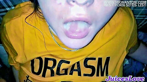 Brunette babe opens wide mouth sticking out wet tongue in orgasm shirt teasing blowjob