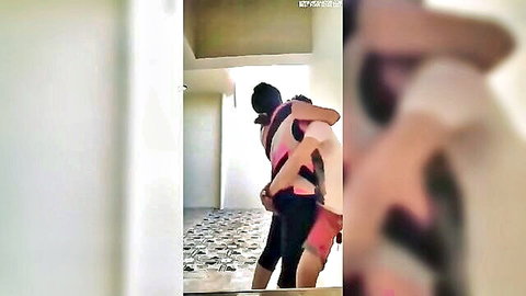 Desi girl in pink top hugs boy Kundan intimately from behind
