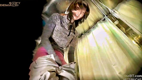 Smiling East Asian amateur squats with pink pants down exposing white panties in shower