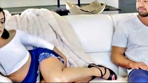 Latina stepdaughter teases stepdad in crop top, shorts and heels on couch