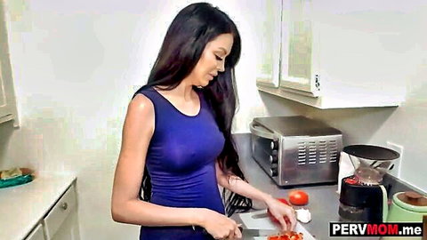 Jamie Michelle in tight blue dress chopping veggies in kitchen tease