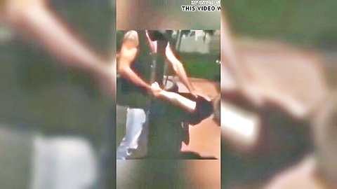Blurry muscular guy lifting woman's spread legs for outdoor standing fuck