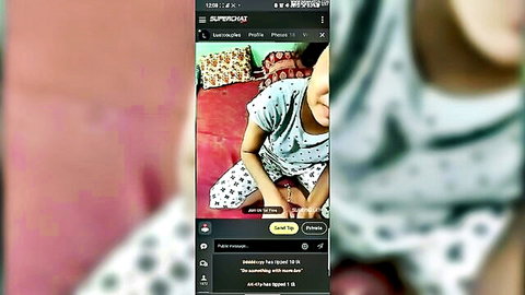 Young Indian girl in pajamas sitting playfully on pink bed in bedroom, WhatsApp chat screenshot