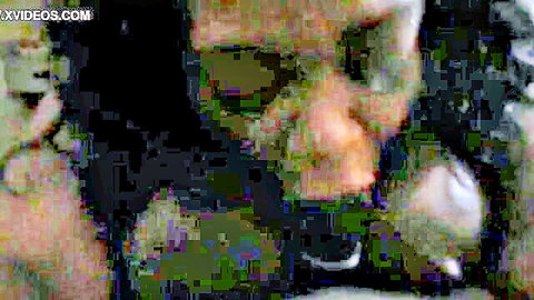 Blurry closeup of woman sucking big cock with cum dripping from her open mouth