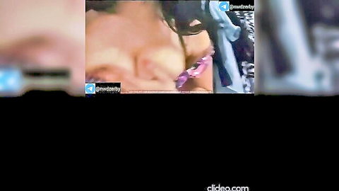Arab amateur woman topless with man in intimate pose