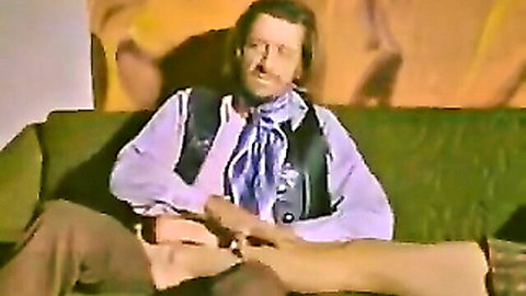 Vintage 1970s couple teasing foot play in classic porn scene