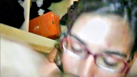 Close-up of brunette woman with glasses in facial scene