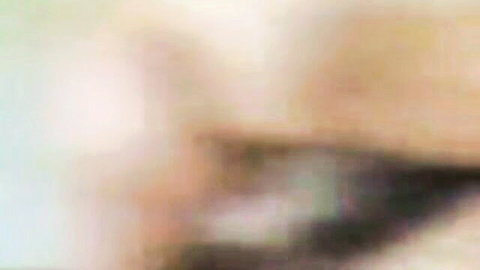Blurry close-up of man eating own cum in solo masturbation scene