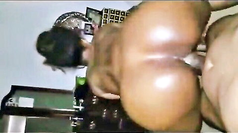 Ebony babe's huge black ass pounded doggy style by thick black cock