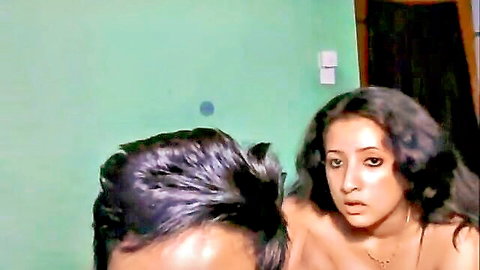Indian MILF topless with bare tits as lover passionately kisses her neck