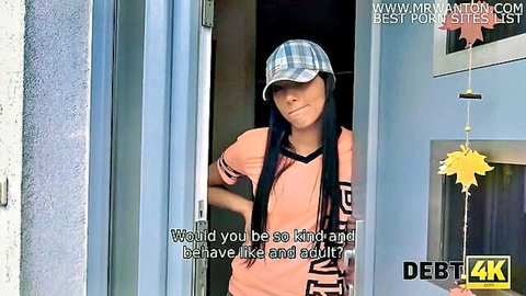 Young skinny brunette teen in plaid cap and pink shirt teases playfully from doorway in adult roleplay
