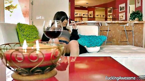 Janice Griffith as sexy babysitter sipping wine seductively