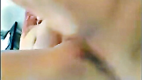Mature massage therapist seducing young client in erotic session