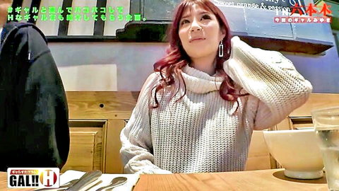 Redhead Japanese babe in white turtleneck sweater sitting surprised at dinner table
