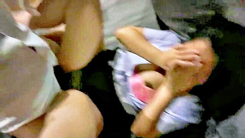Blurry Thai amateur couple intimate moment in hotel, woman covering eyes