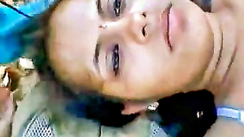 Seductive close-up of beautiful Desi Indian woman with bindi in chudai scene