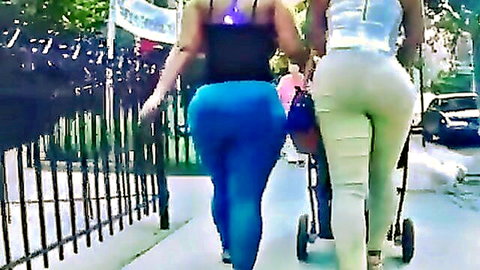Two curvy Latinas with huge asses in tight pants walking outdoors