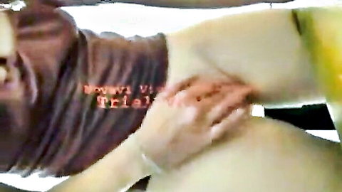 Asian woman in intense squirting orgasm, hand between legs