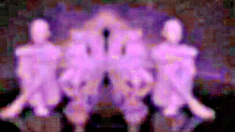 Blurry purple figures sitting teasingly in mysterious adult scene