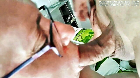 Mature man in glasses receives oral sex from woman in white lingerie