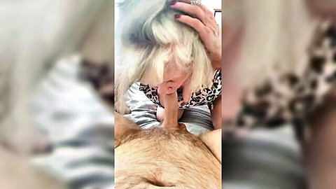 Mature blonde granny in leopard top sucks hairy cock in closeup amateur blowjob