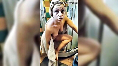 MILF in shower towel slipping exposing huge tits squatting seductively solo