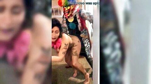 Tattooed woman bent over nude ass exposed with clown behind in explicit revenge fuck