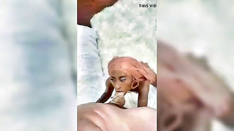 Pink-haired ebony petite sucking thick white cock on furry bed