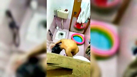 Nude Indian babe bending over in bathroom exposing bare ass and pussy lips