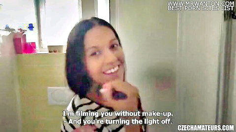 Silvia Dellai smiling while brushing teeth without makeup in candid Czech amateur video