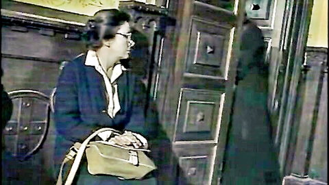Elegant mature woman in suit with glasses, teasing hairy pussy