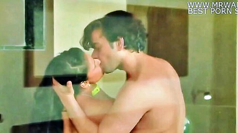 Steamy shower kiss between nude brunette woman and man in Baarish 2020
