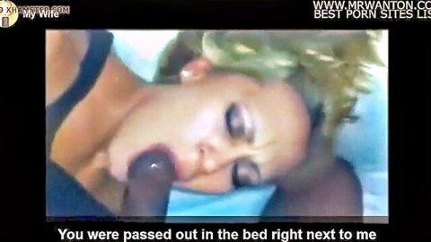 Blonde wife performs intense blowjob on dark dildo while husband sleeps nearby