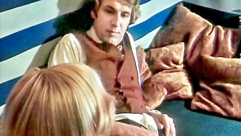 Blonde woman and shaggy-haired man in close intimate chat