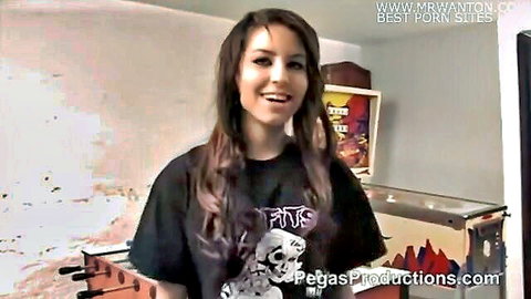 Brunette emo e-girl smiling in oversized black skull Pegasus tee teasing solo