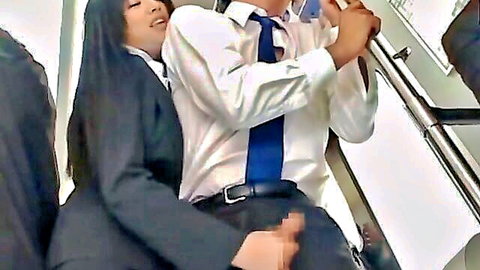 Asian woman in black suit gives handjob to man on escalator, public thrill