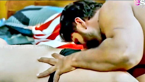 Muscular hunk gropes massive tits of busty Indian babe in lingerie while kissing her neck