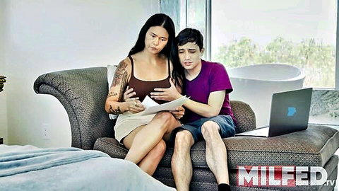 Asian MILF stepmom touches her big tits while helping stepson study