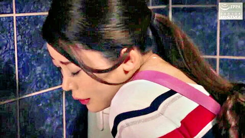 Megumi Meguro seductive side profile in striped top and ponytail