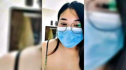 Asian woman in blue mask and glasses, black lingerie straps, viral delivery prank thumbnail