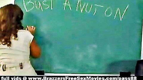 Sexy classroom babe in tight skirt writing 'blast a nut on' on chalkboard teasing viewers