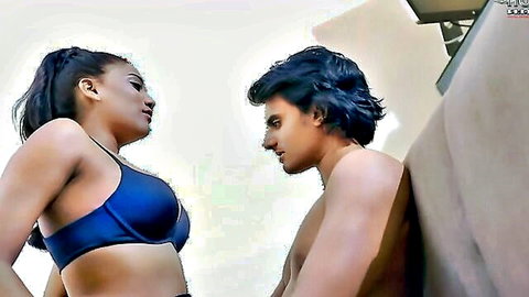 Indian couple intimate erotic pose, woman in blue bra and man shirtless