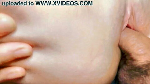 Man's fingers spread wet shaved pussy lips wide open in close-up amateur view